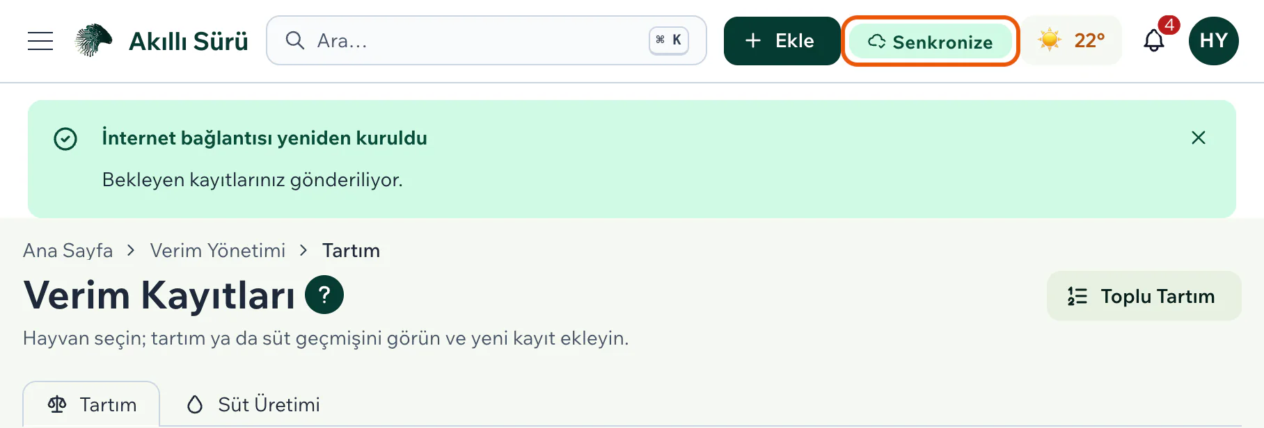 İnternet bağlantısı yeniden kuruldu şeridi; üst çubukta Senkronize yazan eşitleme göstergesi vurgulu